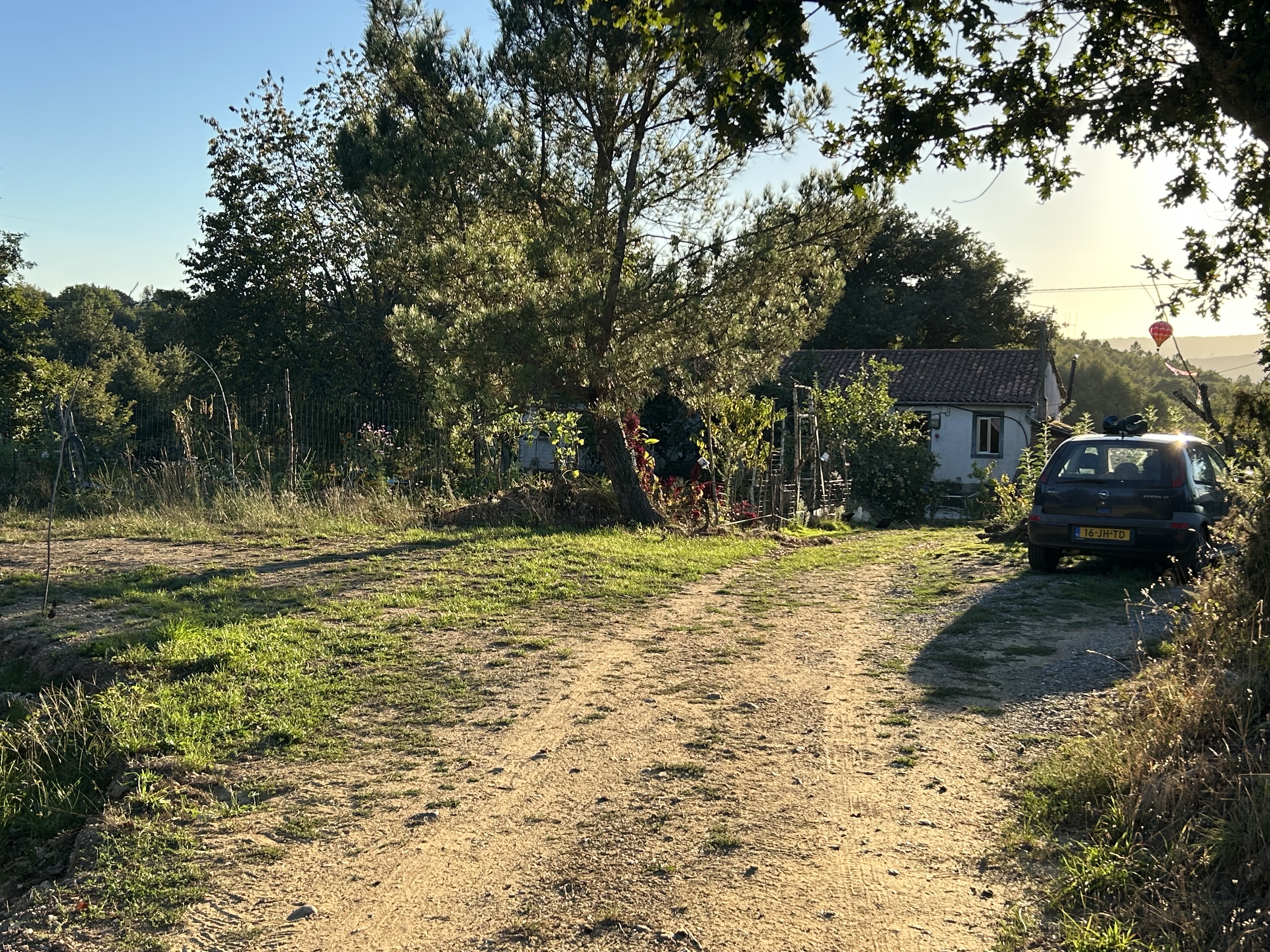 Entrance to the Monte Flor farm along a terraced stone driveway.